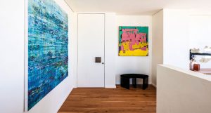 Business Bay penthouse where Kährs Oak Biscotti grounds a bold, creative interior with warm brushed oak and natural depth throughout.