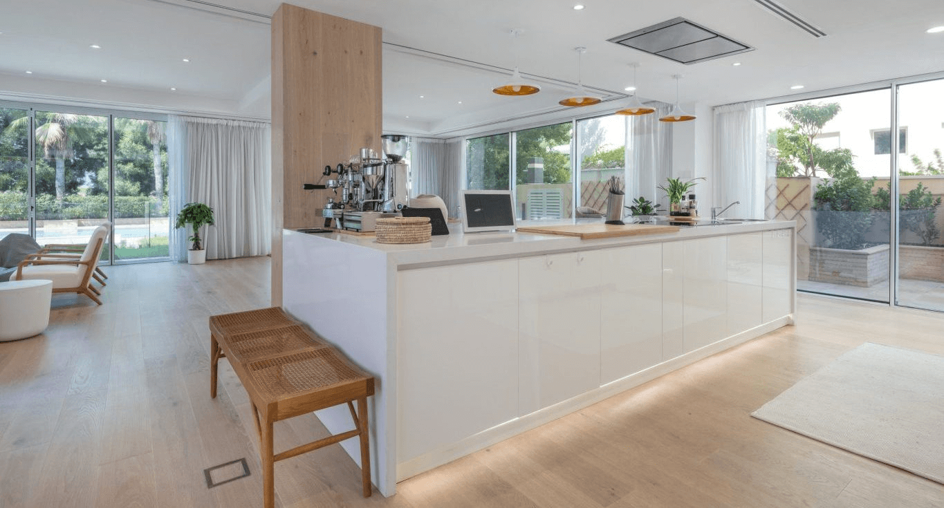 Kitchen flooring in Dubai showcases wood with soft white stain that blends durability and natural character from Nordic Homeworx.