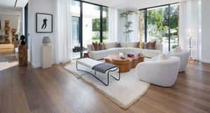 In this Collection Villa living area, Oak Berlin flooring adds understated depth beneath contemporary furnishings. 