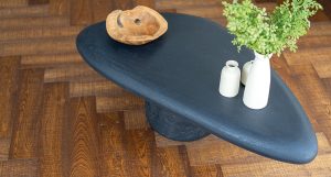 Smoked oak flooring reveals pronounced grain detail and natural variation throughout this Alvorada Villa. 