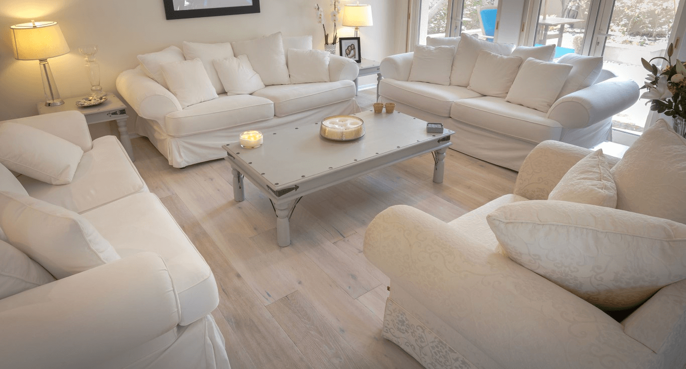 A living area in Savannah Villa, Dubai, featuring rustic Oak wood floor texture with light-toned accents from Nordic Homeworx.