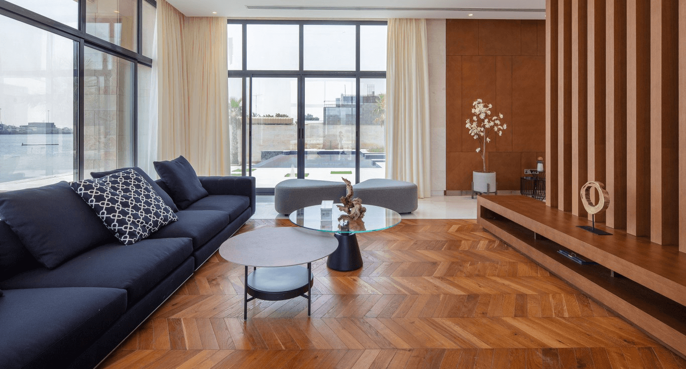 A villa in Ras Al Khaimah, with Kährs Oak wood floor texture in Chevron for a warm, cosy, contemporary interior by Nordic Homeworx