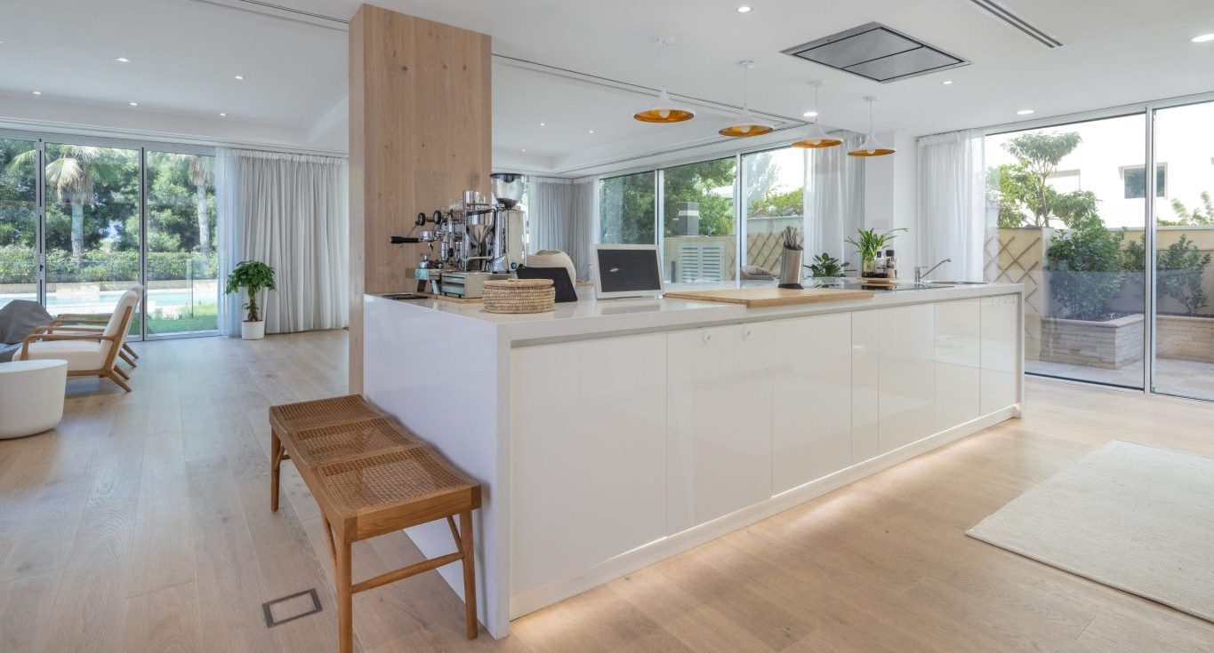 Hattan Villa in The Lakes, Dubai, showcases a modern kitchen complemented by high-quality eco flooring from Nordic Homeworx.