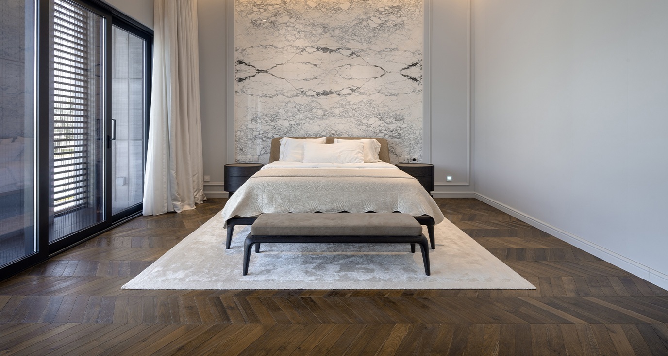 Al Khawaneej Villa in Muhaisnah, Al Khawaneej, Dubai, featuring an elegant dark brown parquet flooring by Nordic Homeworx