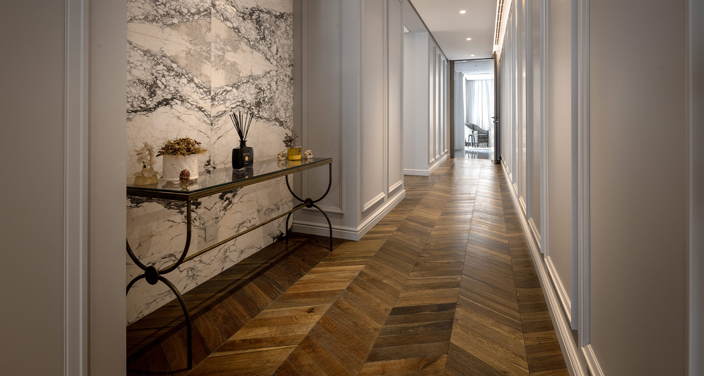 Oak Chevron Dark Brown at a private Al Khawaneej villa, where rich smoked tones and a classic chevron pattern define the character of the space.