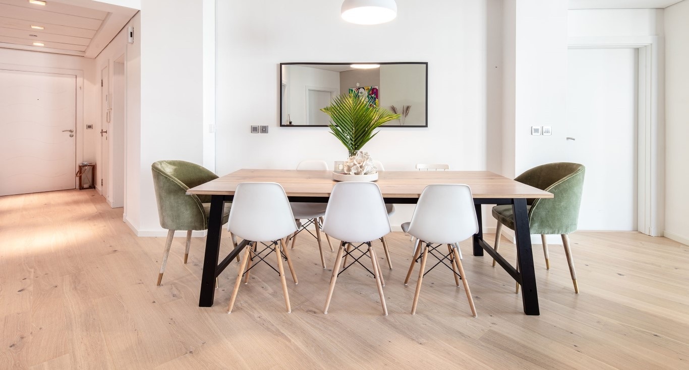 Minimalist interior design at Shoreline Residences Apartment in Palm Jumeirah, Dubai, featuring light oak wood flooring