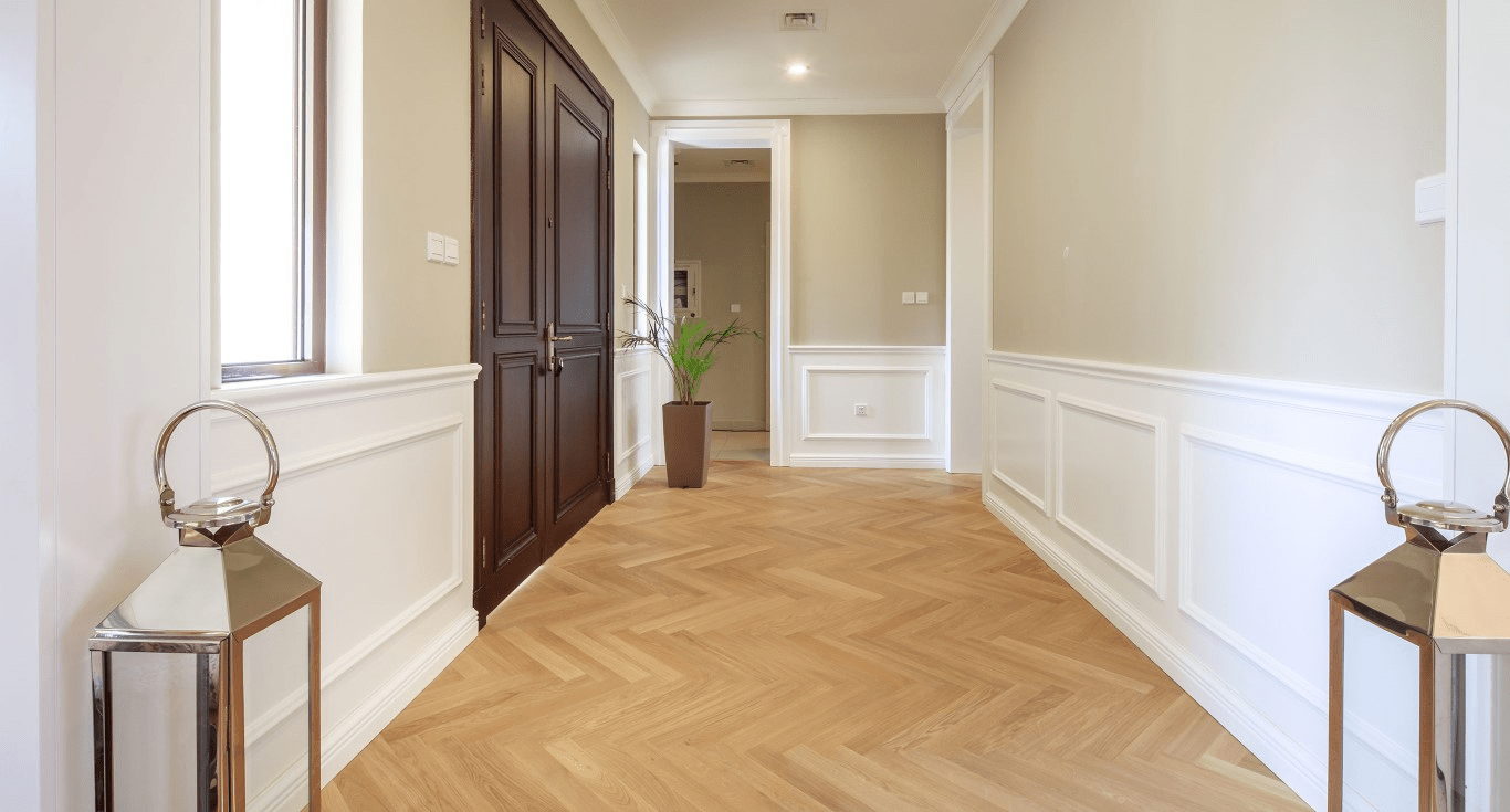 Living room of Rosa Villa in Dubai, featuring classic Studio Oak AB White Herringbone parquet flooring by Nordic Homeworx.