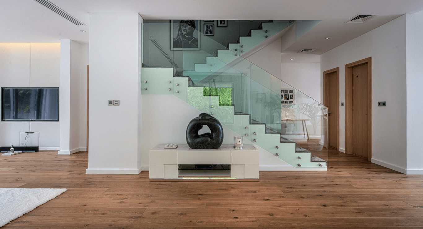 A wood flooring adds natural warmth and sophistication to a villa in Dubai, showcasing home flooring design by Nordic Homeworx.