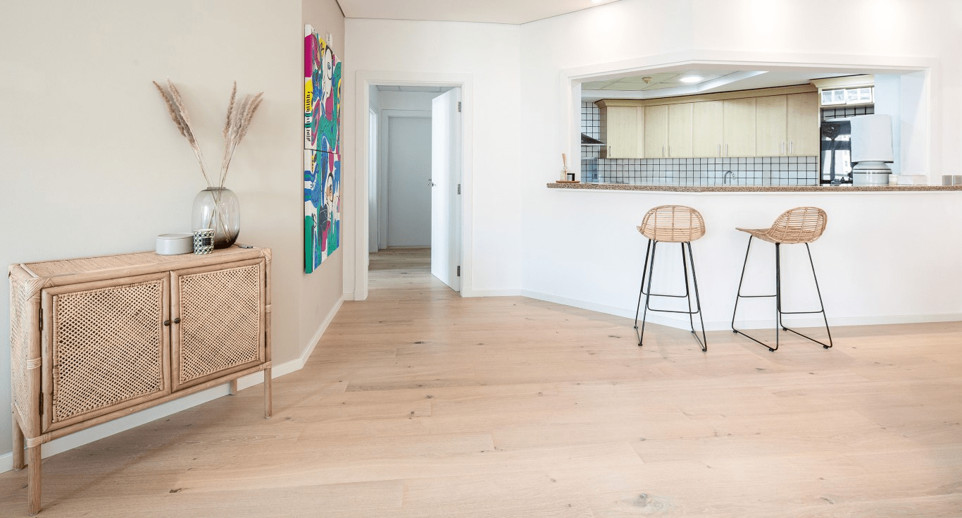 A rustic coastal home flooring design featuring Oak Colony floors at Shoreline Residences, Palm Jumeirah, Dubai by Nordic Homeworx