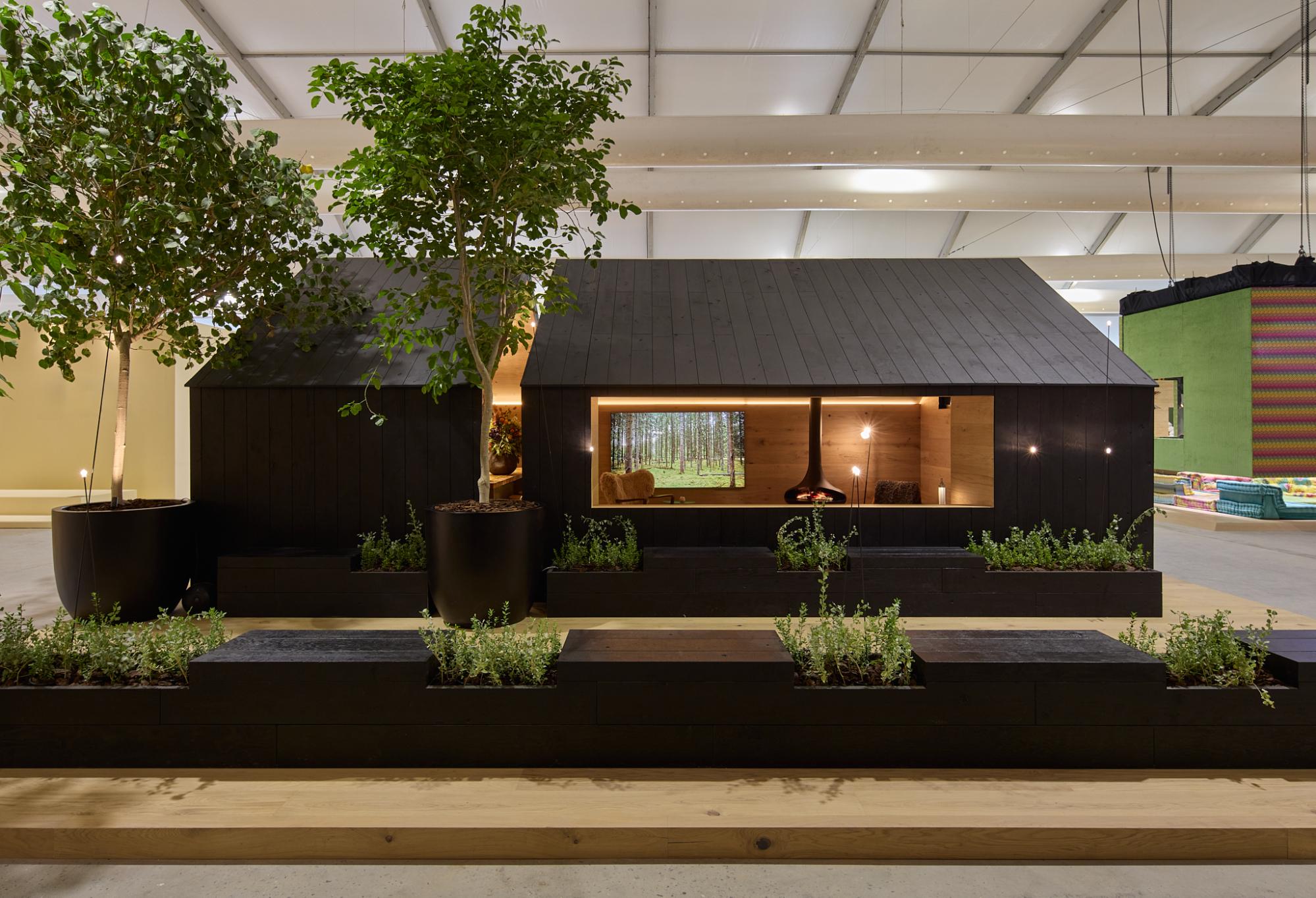 Cosy cabin exterior at Dubai Downtown Design by Nordic Homeworx with wood textures, natural light, and a welcoming atmosphere