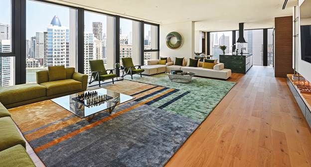 Teak wood colour with a penthouse in Dubai where bold contemporary art meets minimalism.