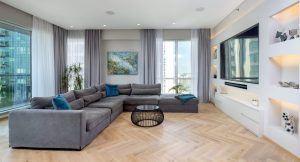 Fairways North Apartment highlights Kährs Herringbone Oak CD White floating floorboards, enhancing bright, airy interiors in Dubai.