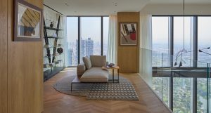 Alt text: One Za’abeel Duplex features pale Kährs Studio Oak AB White chevron flooring with Piazza Oak stairs, creating serene flow