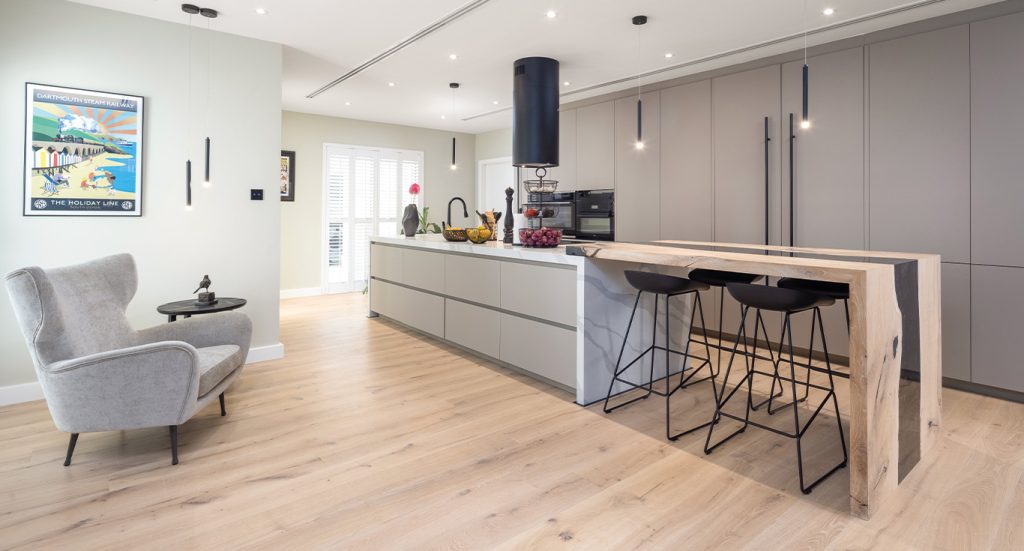 Wider oak boards help extend the sense of openness throughout this light-filled Green Community residence.