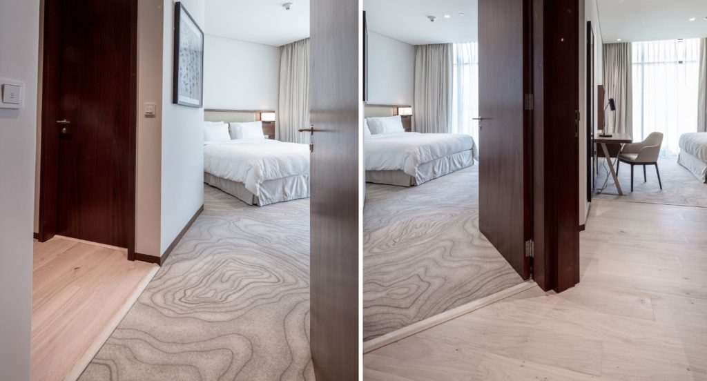 Luxury apartment interior at Vida Residences featuring glare-free ultramatt lacquer 1-strip wide wood flooring.