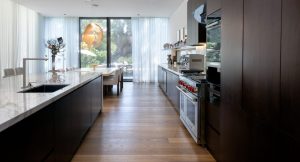 Within this contemporary Al Barari residence, Oak Berlin flooring softens natural light with a restrained matte finish.