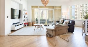 White-oiled hardwood flooring bringing natural character to this Shoreline Residences apartment.