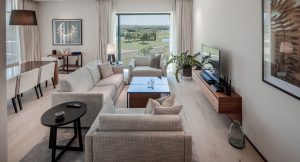 Specialist underlay complementing ultra-matt Oak Sky flooring throughout this thoughtfully designed apartment. . 